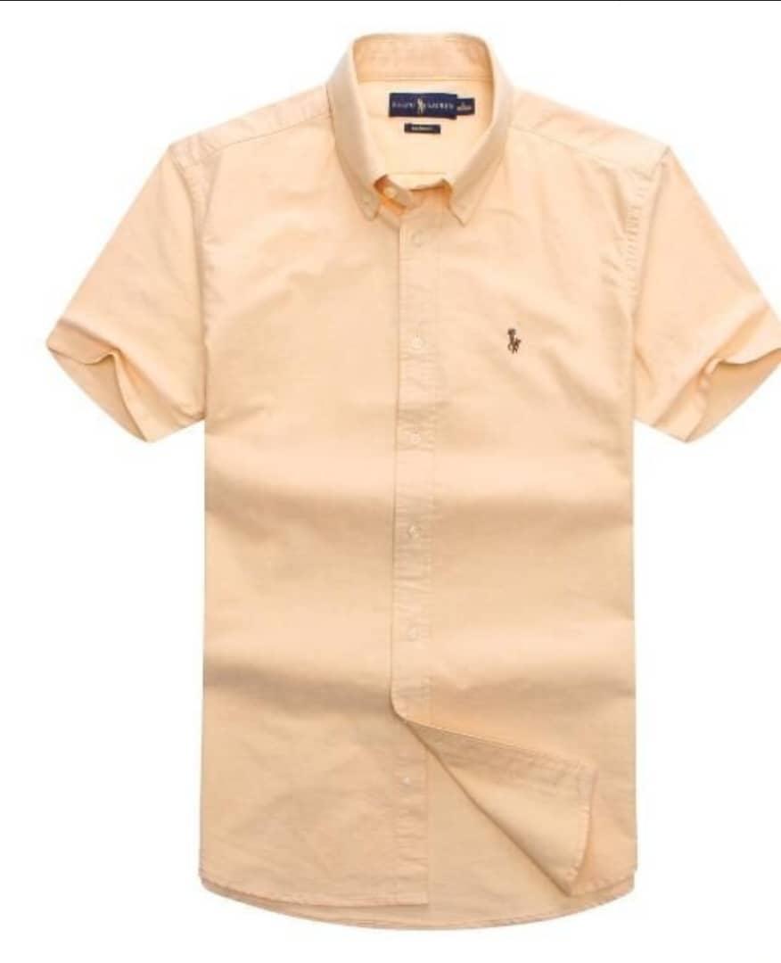 light peach-colored short-sleeve button-up shirt